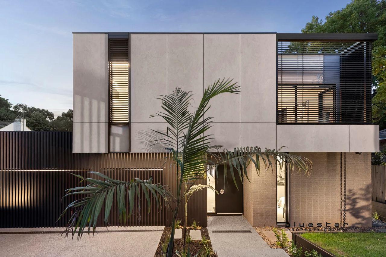 Contemporary home facade with landscaped entry in Melbourne's inner east