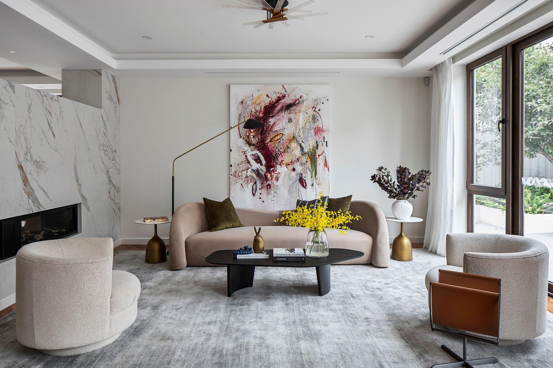Formal living room — Pavlou Brothers listing Formal living room with marble fireplace in a prestige Melbourne home