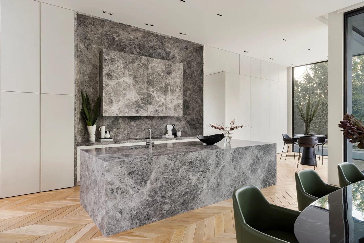 Designer kitchen — Pavlou Brothers listing Marble island kitchen with designer joinery in a Melbourne home for sale