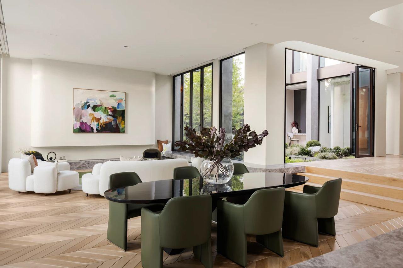 Open plan dining — Pavlou Brothers listing Open plan dining area filled with natural light in a Melbourne home for sale